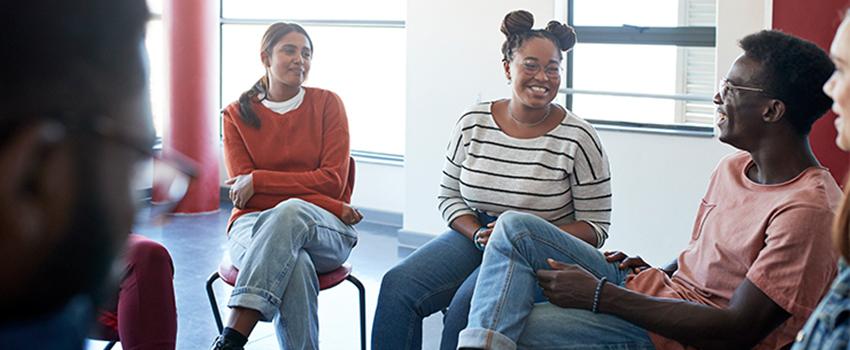 A group talking in group counseling.